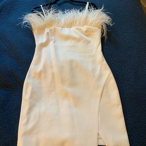 Fun, festive white mini dress- real feathers